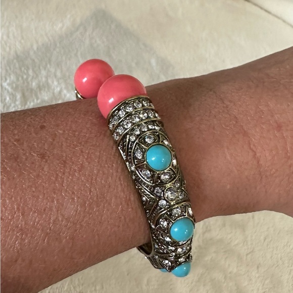 Heidi Daus Coral and Turquoise Hinged Bangle on a Gold toned Backdrop - Picture 4 of 9